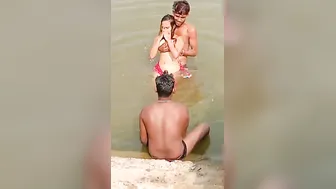 XXX video of Desi girl who flirts with a bunch of guys in a river