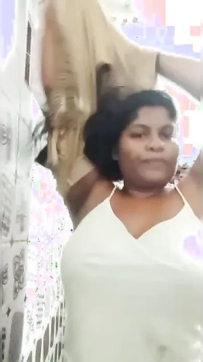 Long-haired Desi hussy takes top off to reveal her big XXX breasts