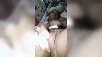 Teen Desi charmer demonstrates her body and plays with XXX pussy