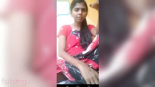 Inept Desi lifts sari up a bit to expose shaved pussy in solo XXX show