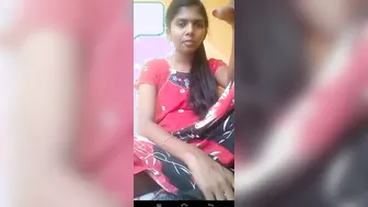 Inept Desi lifts sari up a bit to expose shaved pussy in solo XXX show