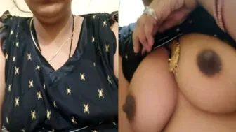 Mature Desi pulls dress up to expose saggy tits in self-made XXX video