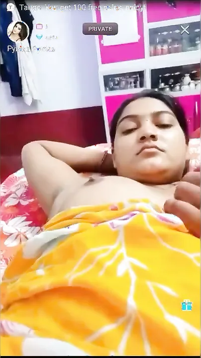 Desi fatty poses in XXX clip with young man who plays with her tits