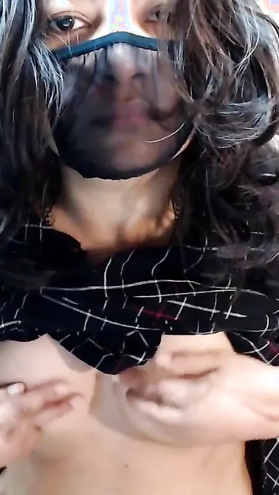 Desi cam girl opens checkered shirt to expose perky tits to XXX fans