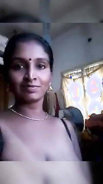 Desi with saggy boobs takes XXX pose on cam and masturbates with toy