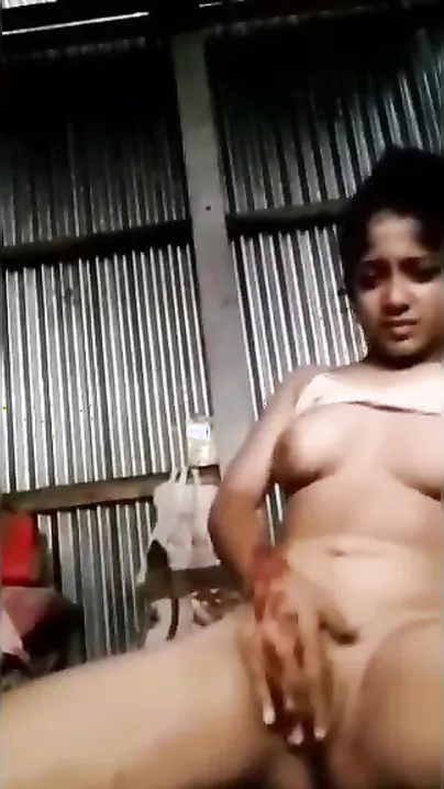 Beautiful Desi XXX girl fingering her teen pussy in the garage