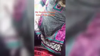 Busty Desi whore strips slowly and sticks fingers into her XXX ass