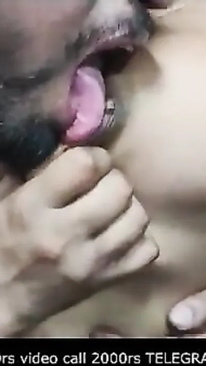 Aroused man kisses and sucks big XXX tits of naked Desi sweetheart