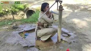 Young village school girl taking a bath in a sari and caught on ...