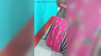 Hot like hell Desi female in sexy pink dress poses for the camera