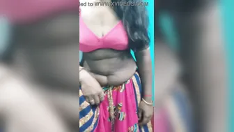 Sultry Desi chick slowly takes pink dress off to show her XXX body