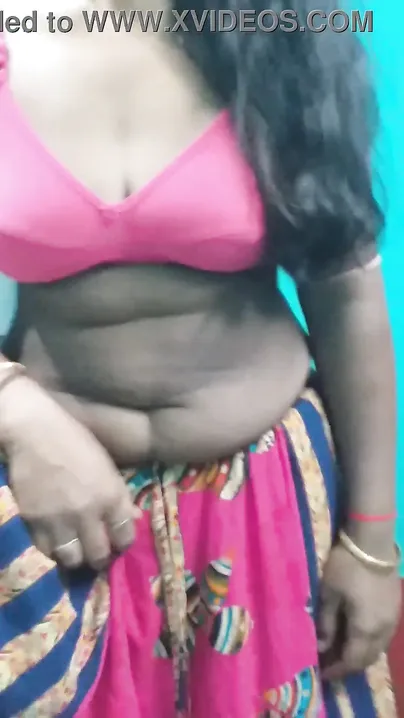 Sultry Desi chick slowly takes pink dress off to show her XXX body