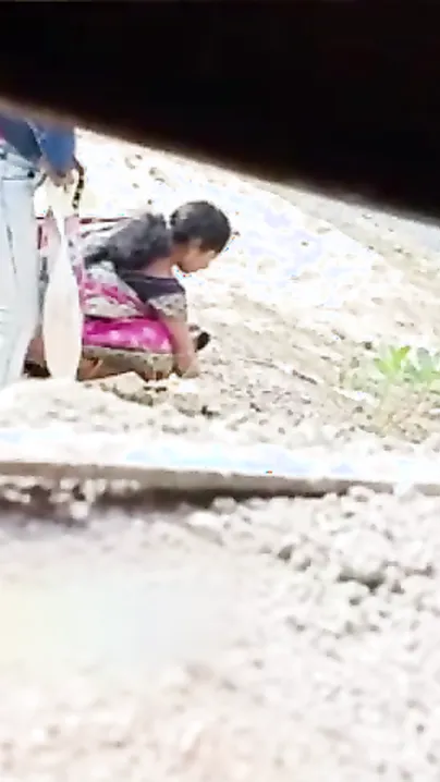 Young Desi girl in sari doesn't know XXX video of her peeing is MMS