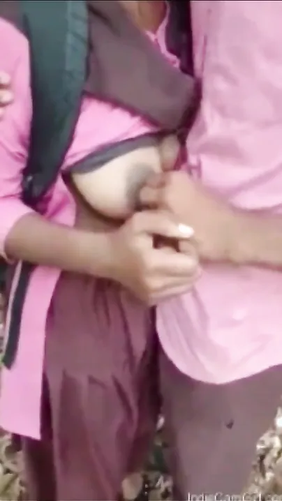 Teacher showing off his student's boobs outdoor. Desi xxx mms