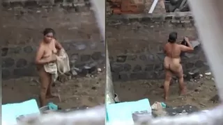 Desi aunty nude captured on hidden cam while bath on outdoor, for ...