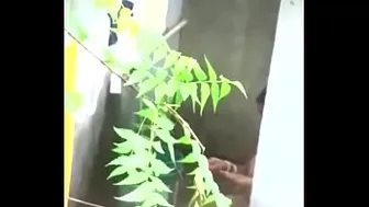 Desi aunty outdoor bath captured secretly on cam by neighbor gets mms leaked online