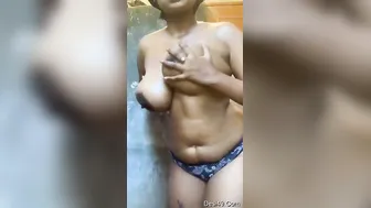Sexy Babe Showing Off Her Big Natural Tits And Shaved Pussy