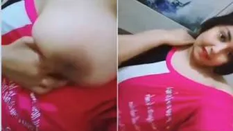 Hot Desi Girl Flaunting Her Massive Tits For The Camera