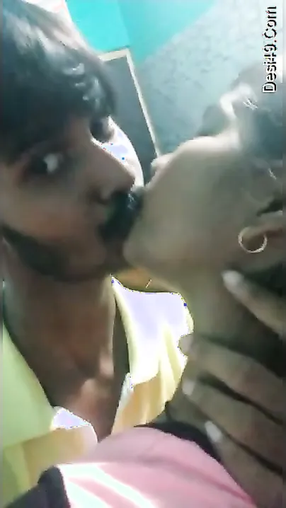 College Lovers Kissing Passionately In Their Secret Hideout