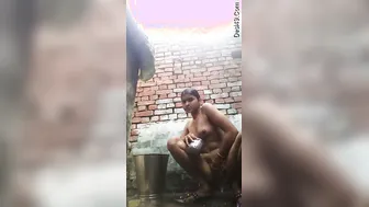Rural Desi Babe Filming Her Outdoor Bathing Selfie For Boyfriend