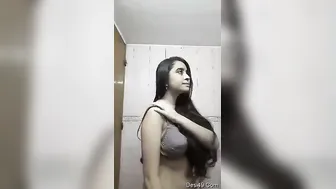 Cute Desi Babe Taking Off Her Top Exposing Boobs For Her Lover
