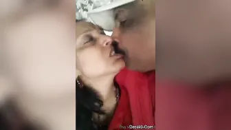 Indian Couple Kissing And Touching Outdoors In Public Park