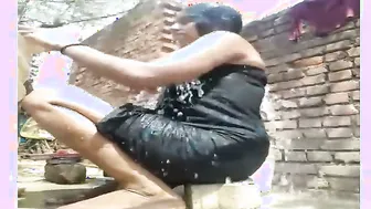 Village Boudi Showing Her Wet Pussy While Bathing On Camera