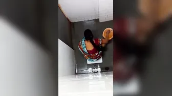 Desi Aunty Caught Pissing In The Bathroom During Private Moment