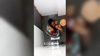 Desi Aunty Caught Pissing In The Bathroom During Private Moment
