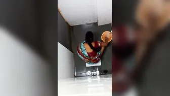 Desi Aunty Caught Pissing In The Bathroom During Private Moment