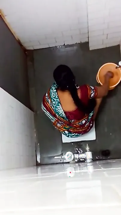 Desi Aunty Caught Pissing In The Bathroom During Private Moment