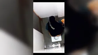 Horny Aunty Squatting Down And Pissing On The Bathroom Floor