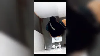 Horny Aunty Squatting Down And Pissing On The Bathroom Floor