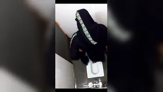 Horny Aunty Squatting Down And Pissing On The Bathroom Floor