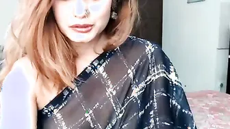 Sexy Bhabhi Stripping Out Of Black Saree Revealing Hot Curves