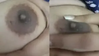 Young Babe Pulling Top Down Exposing Round Tits For Camera