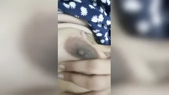 Young Babe Pulling Top Down Exposing Round Tits For Camera