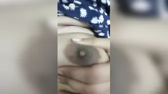 Young Babe Pulling Top Down Exposing Round Tits For Camera