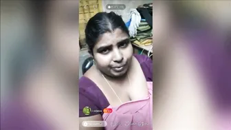 Desi Aunty Teasing With Her Cleavage And Tight Blouse On Camera