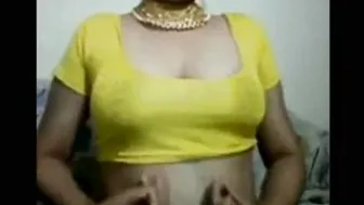 Wife In Yellow Saree Showing Her Boobs Teasing On Webcam For Tips