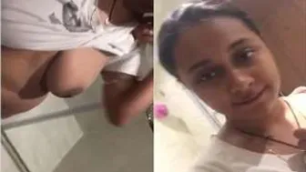 Indian Bhabhi Flaunting Her Big Natural Breasts For The Camera