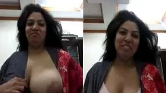 Horny Bhabhi Pulling Out Her Huge Tits For The Camera Tonight