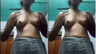 Tamil Bhabhi Squeezing And Playing With Her Big Tits At Home