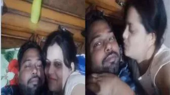 Young Indian Couple Making Out Passionately In Their Bedroom