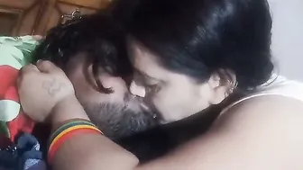 Young Indian Couple Making Out Passionately In Their Bedroom