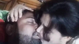 Young Indian Couple Making Out Passionately In Their Bedroom