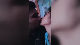 Young Indian Couple Kissing Passionately Outdoors Together