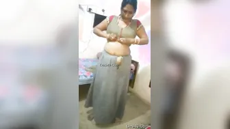 Married Bhabhi Peeling Off Her Clothes Revealing Sexy Curves