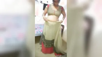 Married Bhabhi Peeling Off Her Clothes Revealing Sexy Curves