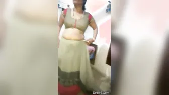 Married Bhabhi Peeling Off Her Clothes Revealing Sexy Curves